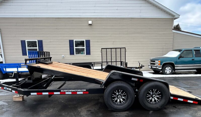 Left side view of bed tilted of 2026 BWISE 7x18-14k Hydraulic Tilt Trailer for sale