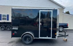 2026 HAULMARK PASSPORT DELUXE 6′ x 10′ ENCLOSED CARGO TRAILER-2,990 GVW V-NOSE, REAR RAMP DOOR(PP610S2-D)