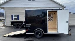 2026 HAULMARK PASSPORT DELUXE 6′ x 10′ ENCLOSED CARGO TRAILER-2,990 GVW V-NOSE, REAR RAMP DOOR(PP610S2-D)