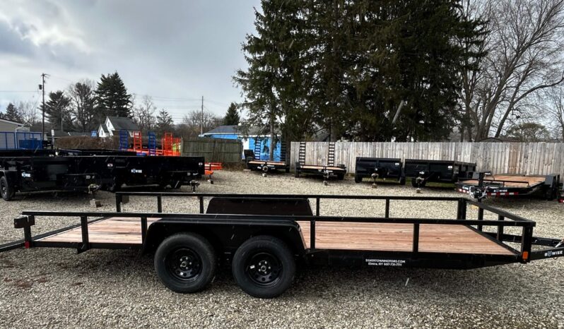 Side view of BWISE 7x18-7k Utility trailer for sale with gate down