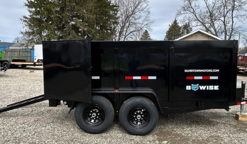 7x12-12k High Sided Dump Trailer for sale Side view with ramps out.