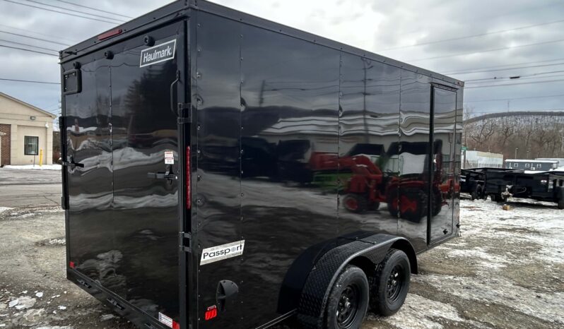 2026 HAULMARK PASSPORT DELUXE 7×16 ENCLOSED TRAILER-7k GVW, PHANTOM BLACK PKG, 7′ INT, V-NOSE, ELECTRIC BRAKES AND RAMP DOOR (PP716T2-D) full