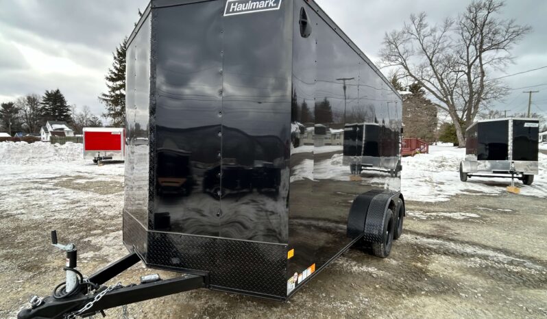 2026 HAULMARK PASSPORT DELUXE 7×16 ENCLOSED TRAILER-7k GVW, PHANTOM BLACK PKG, 7′ INT, V-NOSE, ELECTRIC BRAKES AND RAMP DOOR (PP716T2-D) full