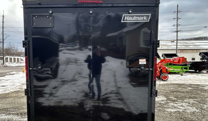 2026 HAULMARK PASSPORT DELUXE 7×16 ENCLOSED TRAILER-7k GVW, PHANTOM BLACK PKG, 7′ INT, V-NOSE, ELECTRIC BRAKES AND RAMP DOOR (PP716T2-D) full