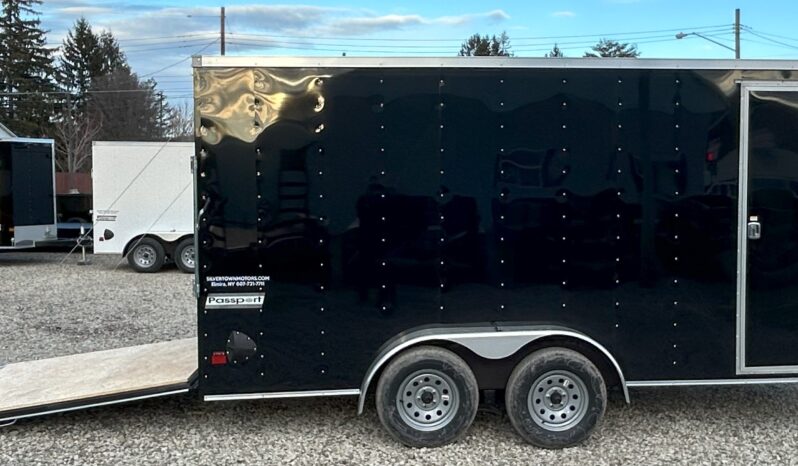 Right side view of 7x16 Haulmark Passport Deluxe with ramp door
