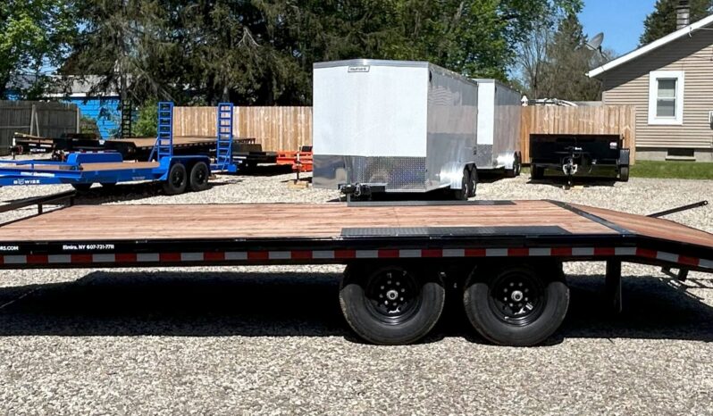 Left side view of 102"x20'-14k GVW Deckover Dump Trailer with dovetail and fold down ramps.