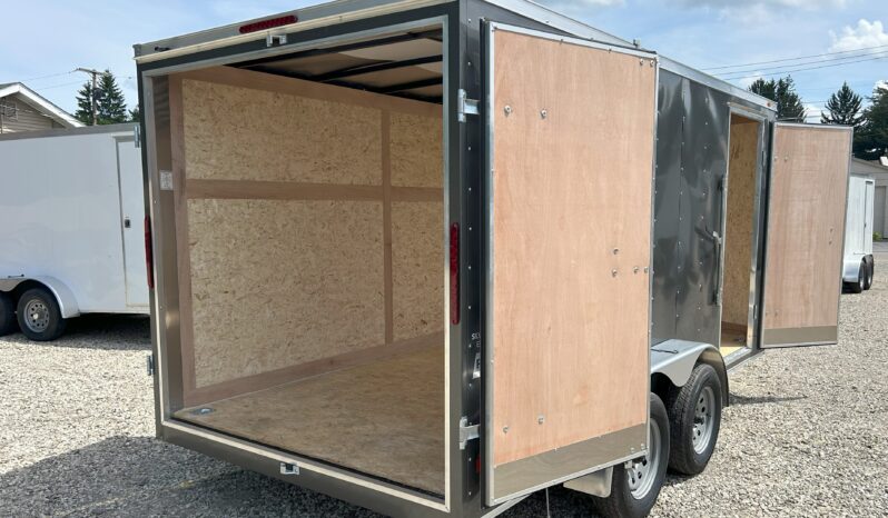 2024 HAULMARK PASSPORT DELUXE 7×14 ENCLOSED CARGO TRAILER-7,000 GVW 6’6″ INTERIOR, V-NOSE, ELECTRIC BRAKES AND REAR BARN DOORS(PP714T2-D) full