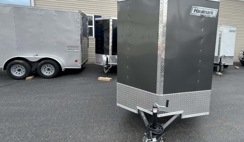 2024 HAULMARK PASSPORT DELUXE 5′ x 8′ ENCLOSED CARGO TRAILER-2,990 GVW V-NOSE, REAR RAMP DOOR(PP58S2-D) full