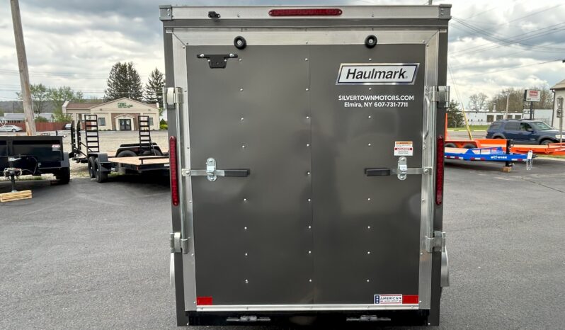 2024 HAULMARK PASSPORT DELUXE 5′ x 8′ ENCLOSED CARGO TRAILER-2,990 GVW V-NOSE, REAR RAMP DOOR(PP58S2-D) full