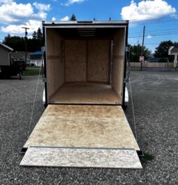 2026 HAULMARK PASSPORT DELUXE 7′ x 12′ ENCLOSED CARGO TRAILER-7,000 GVW, 7’0″ INTERIOR, V-NOSE, ELECTRIC BRAKES AND RAMP DOOR (PP712T2-D)-SILVER full