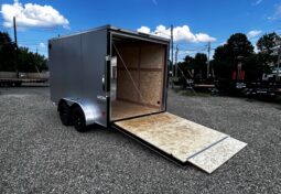 2026 HAULMARK PASSPORT DELUXE 7′ x 12′ ENCLOSED CARGO TRAILER-7,000 GVW, 7’0″ INTERIOR, V-NOSE, ELECTRIC BRAKES AND RAMP DOOR (PP712T2-D)-SILVER full